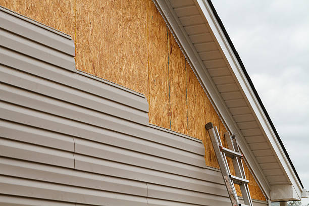 Professional Siding Replacement technician working in Stoneham, MA